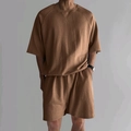 Detail of men summer casual earth tone set showing loose fit drop shoulder tee and shorts - S / Top And Bottom / Khaki