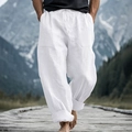 Detail of white linen beach pants showing drawstring waist and side cargo pocket design - S / White