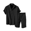 Detail of black short sleeve shirt set with dual chest pockets and textured fabric - S / Black