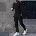 Detail of men's black tracksuit featuring drawstring waist and decorative vertical seams - M / Black Zirconia Set