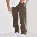 Detail shot of men's olive straight trousers featuring grey side stripes and white buttons - Camel