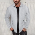 Détail du tissu à texture gaufrée gris clair et poches zippées verticales sur veste homme - Gris clair