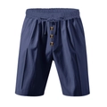 Detail of navy blue linen shorts with elastic drawstring waist and amber buttons - S / Bottoms / Navy Blue