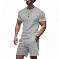 Men's two-piece grey athletic set featuring raglan short sleeve tee and matching shorts - S / Gray