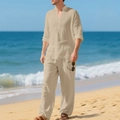 Men's linen set detail with beige long sleeve shirt and trousers on beach background - S / Top And Bottom / Khaki