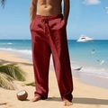 Detail of burgundy linen trousers featuring adjustable drawstring and elastic waistband - Jujube Red