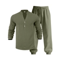 Detailed close-up of olive green cotton linen henley shirt and matching drawstring pants - Green