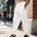 Detailed close-up of white waffle texture fabric on men's jogger cargo pants - S / Bottoms / White