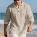 Detail of beige linen long sleeve polo shirt with three-button placket on beach background - S / Tops / Khaki