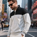 Detail of the diamond quilted pattern and metal zipper on this color block sweatshirt - S / Tops / Black and Light Gray