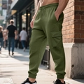 Detail showing olive green waffle knit texture and cargo flap pockets on jogger pants - S / Bottoms / Army Green