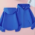 Detailed front and back view of Klein blue zip-up hoodie with ribbed cuffs and hem - Blue
