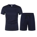 Vue détaillée du tissu en maille bleu marine sur l'ensemble de sport t-shirt et short - S / Bleu marine