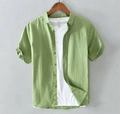 Detail of green linen short-sleeve shirt with turn-down collar and buttoned front design - Army Green