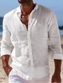Detail of white cotton linen long sleeve shirt with natural fabric texture on beach - S / Tops / White