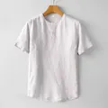 Camisa de lino para hombre en gris claro con cuello redondo Henley y corte holgado - M / Tops / Gris