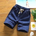 Deep blue linen shorts for men with elastic drawstring waist and stylish wood bead details - L / Blue