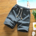 Men's loose linen cotton shorts in grey blue with drawstring waist and wooden bead detail - L / Dark Green
