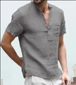 Détail d'une chemise grise en lin pour homme avec col officier et poche boutonnée - S / Hauts / Gris