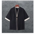 Detail of cotton linen kimono cardigan with traditional frog button and white trim - M / Tops / Black