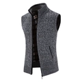 Detail of grey knitted vest showing stand collar, zip closure and plaid lining - M / Tops / Dark Gray