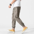 Men's linen lantern pants in light brown featuring drawstring waist and elastic cuffs - Gray