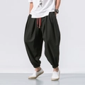 Men's black linen harem pants with a wide-leg cut and contrasting red drawstring details - M / Black