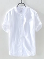 Detail view of white linen cotton shirt showing Mandarin collar and 100% cotton inner tag - S / Tops / White