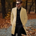 Classic men's mid-length beige wool blend coat with three buttons in autumn forest - XS / Khaki