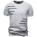 Close-up of crew neck knit T-shirt with navy and yellow stripes on light grey cotton - Light Gray