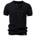 Detail of black ribbed knit Henley shirt with button placket and leather hem label - S / Black