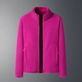 Detail view of pink fleece jacket with stand collar and orange zipper pulls - M / Women Rose Red