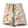 Relaxed fit men cargo shorts in beige featuring elastic drawstring waist and side pockets - XS / Khaki