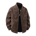Detail van een bruin distressed leren bomberjack met geribbelde manchetten en rits - M / koffiekleur
