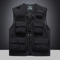 Detail of multi-pocket tactical vest showing V-neck design and breathable mesh lining - M / Black