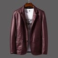 Detailed close-up of dark wine red PU leather blazer jacket with classic notched lapels - M / Burgundy
