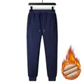 Detail of navy men's fleece-lined joggers showing warm interior and elastic waistband - L / Blue Jogger