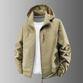 Chaqueta outdoor caqui para hombre con capucha, tejido cortavientos y estampado de montaña - M / Caqui