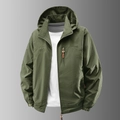 Chaqueta cortavientos de hombre verde militar con capucha y cremallera frontal - M / Verde Militar