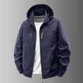 Chaqueta cortavientos azul oscuro con capucha para hombre y logotipo de montaña outdoor - M / Azul oscuro