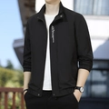 Men's black outdoor jacket with stand collar and zipper closure on a street model - M / Black