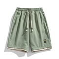 Pantaloncini sportivi uomo verde salvia ad asciugatura rapida con coulisse in vita - L / Verde