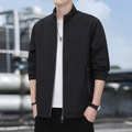 Chaqueta casual negra para hombre con cuello alto, bolsillos con cremallera y puños elásticos - M / Negro