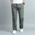 Men's straight-leg casual trousers in sage green with elastic waist and side pockets - M / Army Green