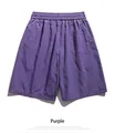 Detail view of purple quick-dry men's shorts with elastic waist and back pocket - S / Purple