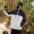 Waterproof windbreaker jacket in black and white color block design with multiple pockets - XS / Off White