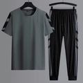 Ensemble sport homme en soie glacée avec t-shirt manches courtes et pantalon rayé gris - M / Gris