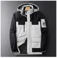 Detail view of winter outdoor jacket with fleece lining and multiple zip pockets - L / Ivory