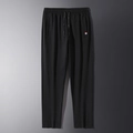 Pantalones deportivos negros para hombre con cordón y detalle de cinta tricolor - M / Negro