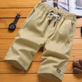 Herren-Shorts aus khakifarbener Baumwolle mit elastischem Kordelzug und NICE-Schriftzug - M / Khaki